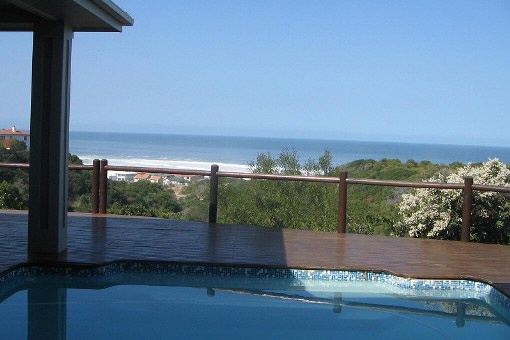 Large pool with ocean view