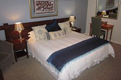 King size bed in one of the 8 bedrooms